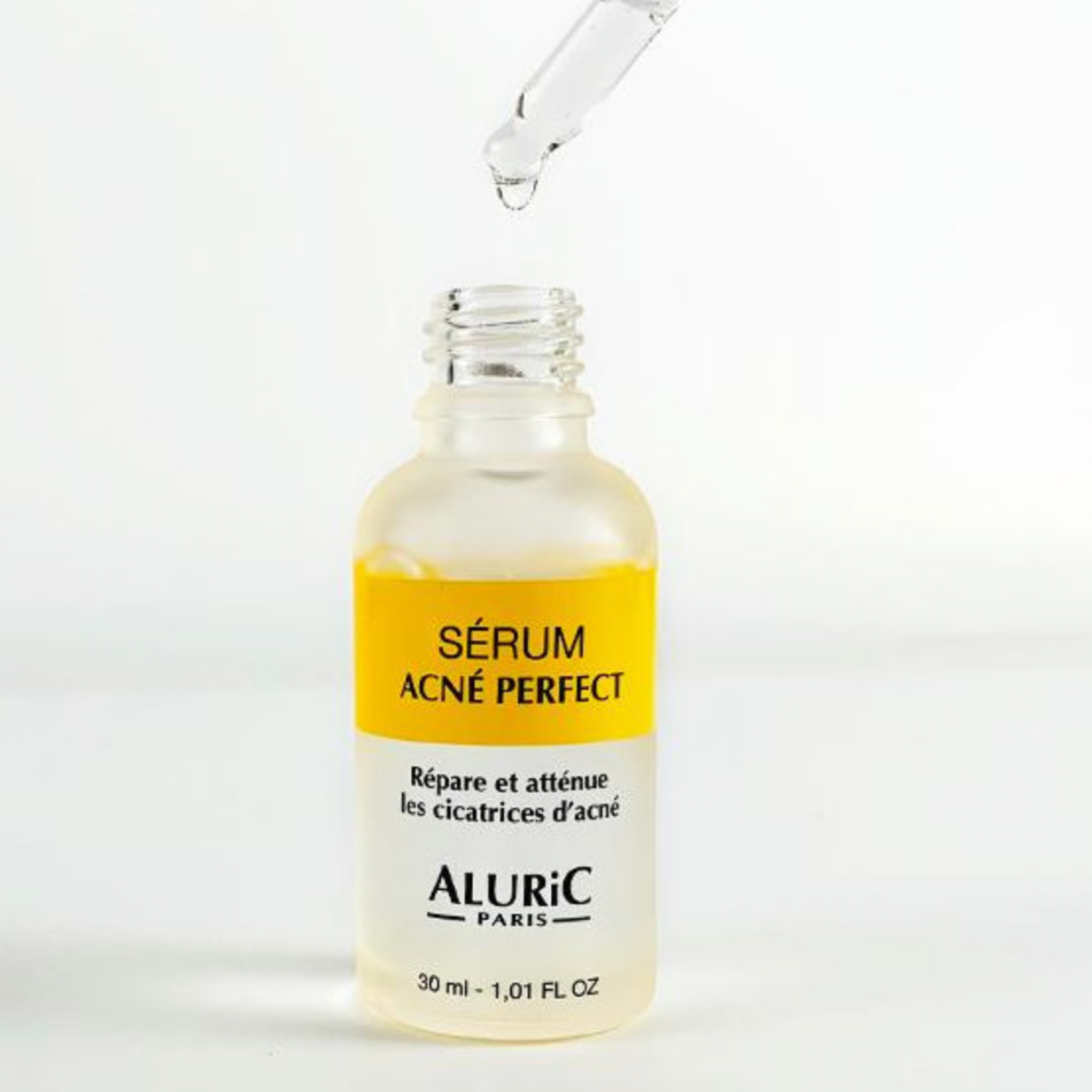 Flacon sérum anti-boutons pour le visage